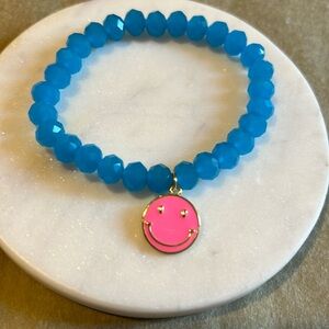 Blue and pink smile face bracelet